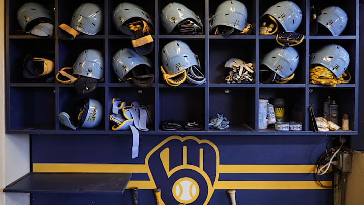 May 31, 2024; Milwaukee, Wisconsin, USA; General view of Milwaukee Brewers batting helmets in the dugout prior to the game against the Chicago White Sox at American Family Field. Mandatory Credit: Jeff Hanisch-Imagn Images May 31, 2024; Milwaukee, Wisconsin, USA; General view of Milwaukee Brewers batting helmets in the dugout prior to the game against the Chicago White Sox at American Family Field. Mandatory Credit: Jeff Hanisch-Imagn Images