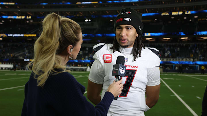 Dec 27, 2025; Inglewood, California, USA;  Houston Texans quarterback C.J. Stroud (7) is interviewed after the game against the Los Angeles Chargers following a game at SoFi Stadium. Mandatory Credit: Kiyoshi Mio-Imagn Images