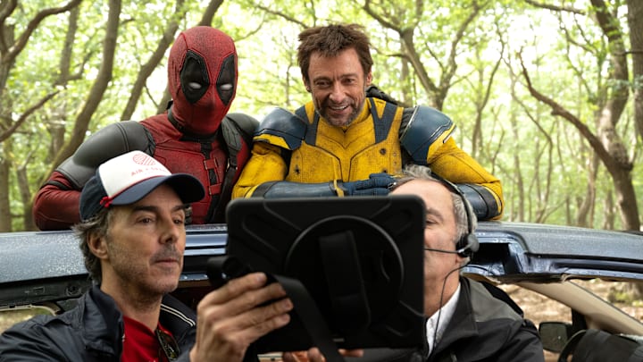 (L-R): Director Shawn Levy, Ryan Reynolds, and Hugh Jackman on the set of Marvel Studios' DEADPOOL & WOLVERINE. Photo by Jay Maidment. © 2024 20th Century Studios / © and ™ 2024 MARVEL.
