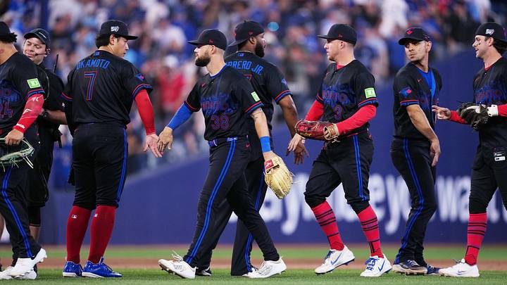 Toronto Blue Jays celebrate their win at Rogers Centre. Toronto Blue Jays celebrate their win at Rogers Centre.