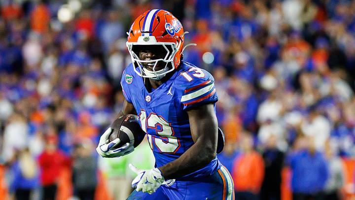 Nov 29, 2025; Gainesville, Florida, USA; Florida Gators running back Jadan Baugh (13) rushes with the ball against the Florida State Seminoles during the second half at Ben Hill Griffin Stadium. Mandatory Credit: Matt Pendleton-Imagn Images Nov 29, 2025; Gainesville, Florida, USA; Florida Gators running back Jadan Baugh (13) rushes with the ball against the Florida State Seminoles during the second half at Ben Hill Griffin Stadium. Mandatory Credit: Matt Pendleton-Imagn Images