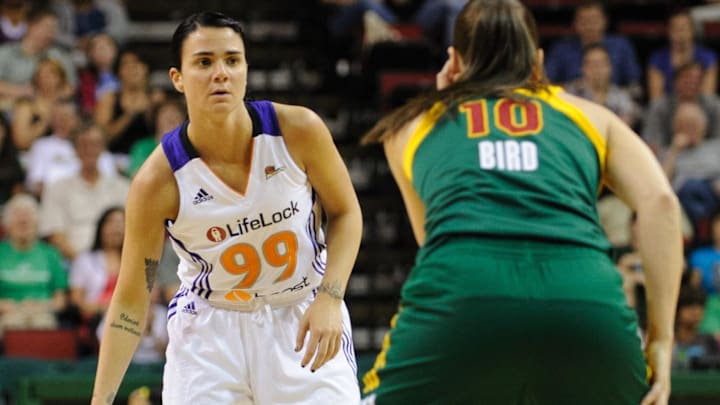 Jul 8, 2012; Seattle, WA, USA; Phoenix Mercury guard Samantha Prahalis (99) looks for an open teammate while being guarded by Seattle Storm guard Sue Bird (10) during the 1st half at KeyArena. Mandatory Credit: Steven Bisig-Imagn Images