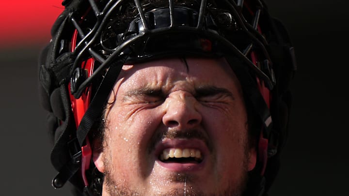 Cincinnati Bearcats offensive lineman Jonathan Harder takes a break between repetitions during spring football practice, Monday, March 4, 2024, at Nippert Stadium in Cincinnati.