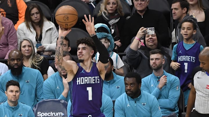 Jan 20, 2025; Charlotte, North Carolina, USA;  Charlotte Hornets guard LaMelo Ball (1) shoots during the first half against the Dallas Mavericks at the Spectrum Center. Mandatory Credit: Sam Sharpe-Imagn Images