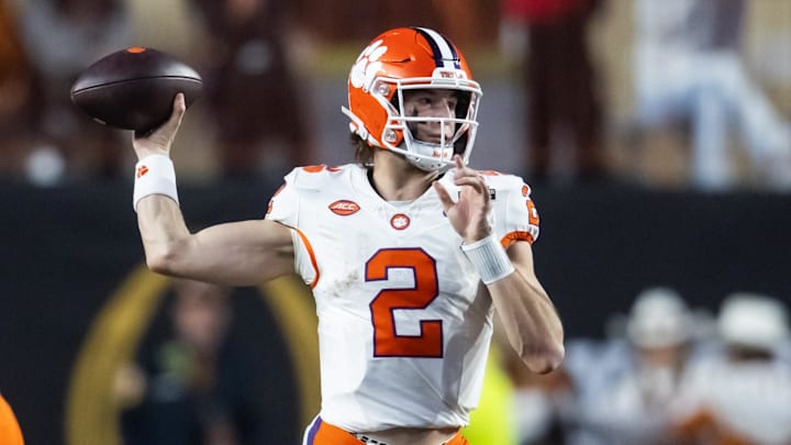 Dec 21, 2024; Austin, Texas, USA; Clemson Tigers quarterback Cade Klubnik (2) against the Texas Longhorns during the CFP National playoff first round at Darrell K Royal-Texas Memorial Stadium. Mandatory Credit: Mark J. Rebilas-Imagn Images Dec 21, 2024; Austin, Texas, USA; Clemson Tigers quarterback Cade Klubnik (2) against the Texas Longhorns during the CFP National playoff first round at Darrell K Royal-Texas Memorial Stadium. Mandatory Credit: Mark J. Rebilas-Imagn Images