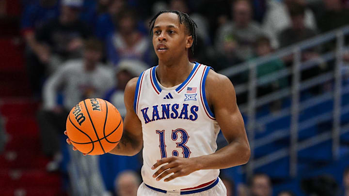 Dec 16, 2025; Lawrence, Kansas, USA; Kansas Jayhawks guard Elmarko Jackson (13) dribbles the ball during the second half against the Towson Tigers at Allen Fieldhouse. Mandatory Credit: Jay Biggerstaff-Imagn Images Dec 16, 2025; Lawrence, Kansas, USA; Kansas Jayhawks guard Elmarko Jackson (13) dribbles the ball during the second half against the Towson Tigers at Allen Fieldhouse. Mandatory Credit: Jay Biggerstaff-Imagn Images