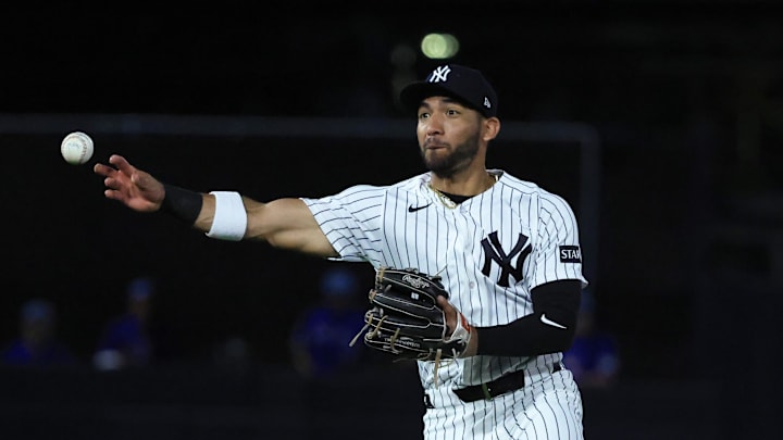 Mar 11, 2026; Tampa, Florida, USA;  New York Yankees shortstop Jose Caballero (72) throws the ball to first base during the fifth inning against the Toronto Blue Jays at George M. Steinbrenner Field. Mandatory Credit: Kim Klement Neitzel-Imagn Images