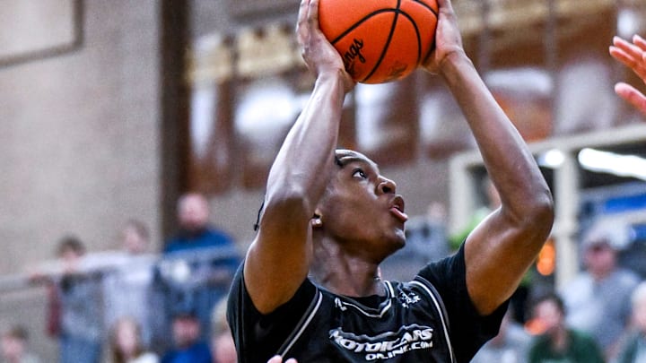 Team Motorsports and Michigan State's Cam Ward shoots against Team Faygo during the Moneyball Pro-Am on Thursday, July 18, 2025, at Holt High School. Team Motorsports and Michigan State's Cam Ward shoots against Team Faygo during the Moneyball Pro-Am on Thursday, July 18, 2025, at Holt High School.