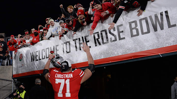Jan 1, 2022; Pasadena, CA, USA; Ohio State Buckeyes offensive lineman Ben Christman (71) celebrates as he leaves the field after defeating the Utah Utes during the 2022 Rose Bowl college football game at the Rose Bowl. Mandatory Credit: Orlando Ramirez-Imagn Images Jan 1, 2022; Pasadena, CA, USA; Ohio State Buckeyes offensive lineman Ben Christman (71) celebrates as he leaves the field after defeating the Utah Utes during the 2022 Rose Bowl college football game at the Rose Bowl. Mandatory Credit: Orlando Ramirez-Imagn Images