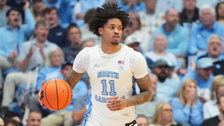 Feb 28, 2026; Chapel Hill, North Carolina, USA; North Carolina Tar Heels forward Jonathan Powell (11) with the ball in the second half at Dean E. Smith Center. Mandatory Credit: Bob Donnan-Imagn Images