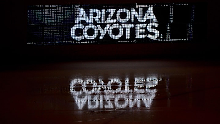 Oct 14, 2017; Glendale, AZ, USA; The Arizona Coyotes logo is reflected on the ice prior to the game