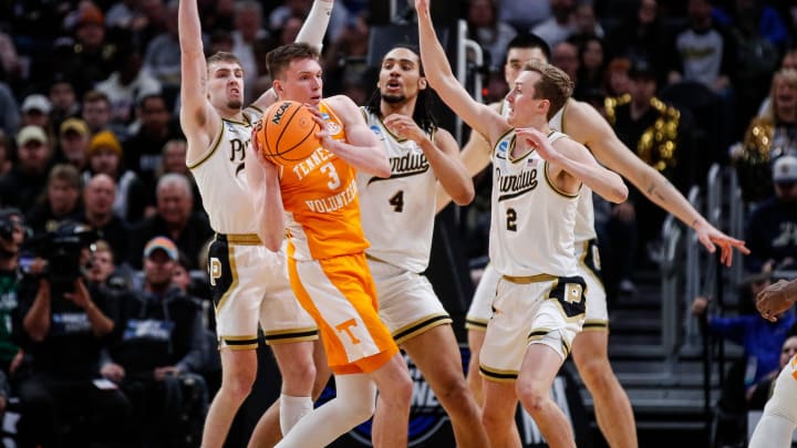 Tennessee guard Dalton Knecht (3) looks to pass against Purdue during the first half of the NCAA tournament Midwest Regional Elite 8 round at Little Caesars Arena in Detroit on Sunday, March 31, 2024. Tennessee guard Dalton Knecht (3) looks to pass against Purdue during the first half of the NCAA tournament Midwest Regional Elite 8 round at Little Caesars Arena in Detroit on Sunday, March 31, 2024.