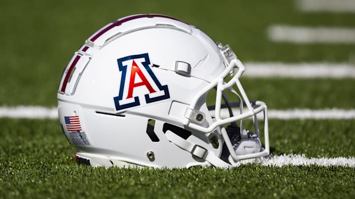 Nov 25, 2022; Tucson, Arizona, USA; Detailed view of an Arizona Wildcats helmet on the field during the Territorial Cup at Arizona Stadium. Mandatory Credit: Mark J. Rebilas-Imagn Images