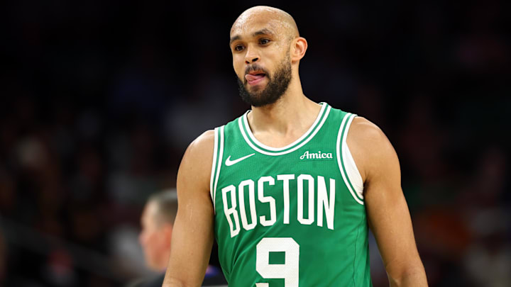 Feb 24, 2026; Phoenix, Arizona, USA; Boston Celtics guard Derrick White (9) against the Phoenix Suns at Mortgage Matchup Center. Mandatory Credit: Mark J. Rebilas-Imagn Images