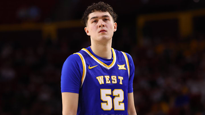 Jan 21, 2026; Tempe, Arizona, USA; West Virginia Mountaineers forward Treysen Eaglestaff (52) against the Arizona State Sun Devils at Desert Financial Arena. Mandatory Credit: Mark J. Rebilas-Imagn Images Jan 21, 2026; Tempe, Arizona, USA; West Virginia Mountaineers forward Treysen Eaglestaff (52) against the Arizona State Sun Devils at Desert Financial Arena. Mandatory Credit: Mark J. Rebilas-Imagn Images