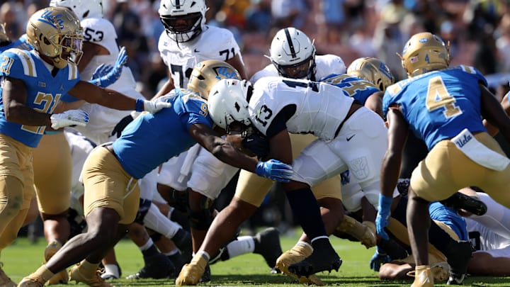 Oct 4, 2025; Pasadena, California, USA;  Penn State Nittany Lions running back Kaytron Allen (13) scores a touchdown during the fourth quarter against the UCLA Bruins at Rose Bowl. Mandatory Credit: Kiyoshi Mio-Imagn Images