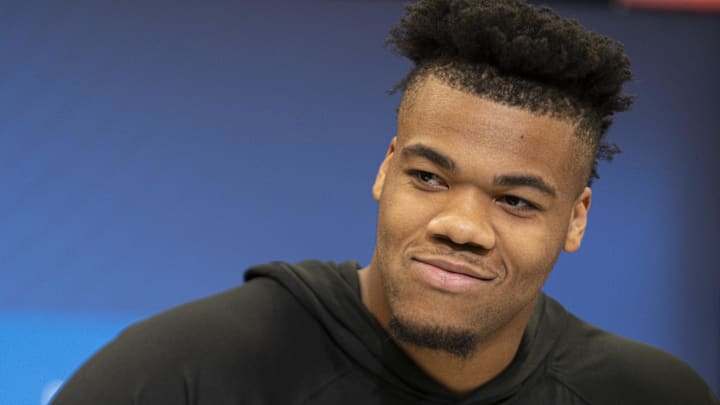 Ajani Cornelius answers questions at a press conference during the 2025 NFL Combine 