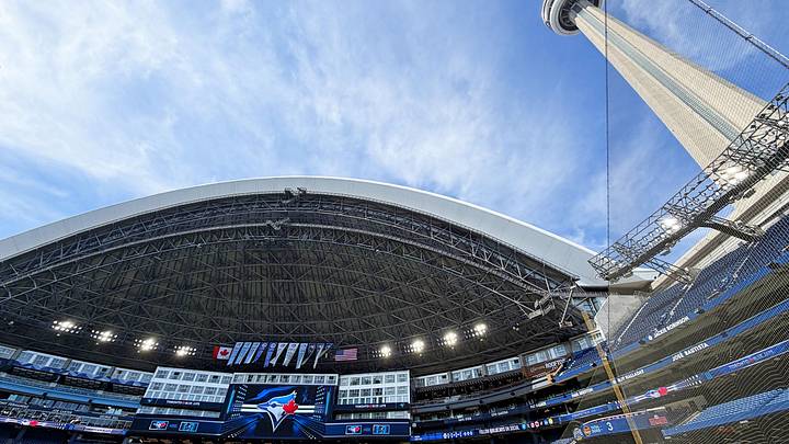 A general view of the Rogers Centre with the roof open during batting practice before a game. A general view of the Rogers Centre with the roof open during batting practice before a game.