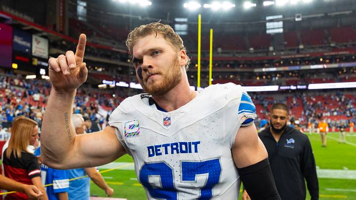 Oct 11, 2026; Glendale, Arizona, USA; Detroit Lions defensive end Aidan Hutchinson (97) reacts after defeating the Arizona Cardinals at State Farm Stadium. Mandatory Credit: Mark J. Rebilas-Imagn Images Oct 11, 2026; Glendale, Arizona, USA; Detroit Lions defensive end Aidan Hutchinson (97) reacts after defeating the Arizona Cardinals at State Farm Stadium. Mandatory Credit: Mark J. Rebilas-Imagn Images