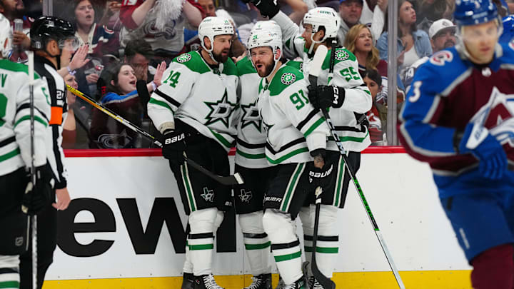 May 17, 2024; Denver, Colorado, USA; Dallas Stars left wing Jamie Benn (14) celebrates his goal scored with center Tyler Seguin (91) and defenseman Thomas Harley (55) and defenseman Miro Heiskanen (4) in the third period against the Colorado Avalanche in game six of the second round of the 2024 Stanley Cup Playoffs at Ball Arena. Mandatory Credit: Ron Chenoy-Imagn Images