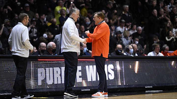 Feb 8, 2022; West Lafayette, Indiana, USA; Purdue Boilermakers head coach Matt Painter and Illinois Fighting Illini head coach Brad Underwood talk after the game at Mackey Arena. Boilermakers won 84-68. Mandatory Credit: Marc Lebryk-Imagn Images