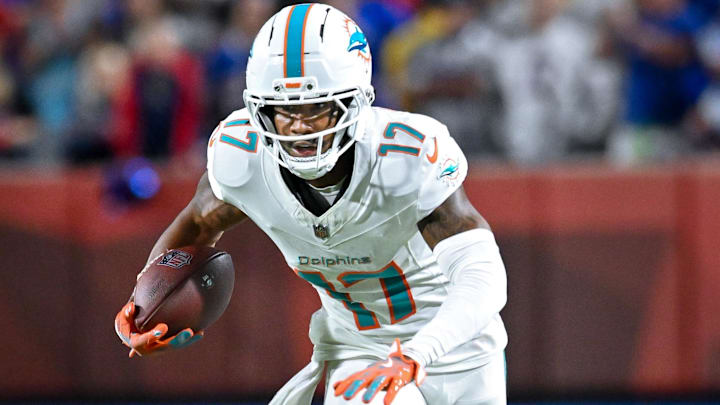 Miami Dolphins wide receiver Jaylen Waddle (17) carries the ball after making a catch in the fourth quarter against the Buffalo Bills at Highmark Stadium.