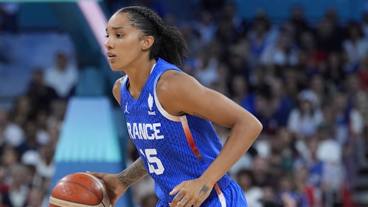 Aug 4, 2024; Villeneuve-d'Ascq, France; France forward Gabby Williams (15) controls the ball against Australia in the first half in a women’s group B game during the Paris 2024 Olympic Summer Games at Stade Pierre-Mauroy. Mandatory Credit: John David Mercer-Imagn Images Aug 4, 2024; Villeneuve-d'Ascq, France; France forward Gabby Williams (15) controls the ball against Australia in the first half in a women’s group B game during the Paris 2024 Olympic Summer Games at Stade Pierre-Mauroy. Mandatory Credit: John David Mercer-Imagn Images