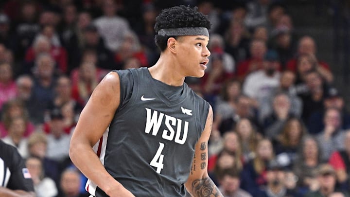 Jan 11, 2025; Spokane, Washington, USA; Washington State Cougars forward LeJuan Watts (4) controls the ball against the Gonzaga Bulldogs in the first half at McCarthey Athletic Center. Mandatory Credit: James Snook-Imagn Images Jan 11, 2025; Spokane, Washington, USA; Washington State Cougars forward LeJuan Watts (4) controls the ball against the Gonzaga Bulldogs in the first half at McCarthey Athletic Center. Mandatory Credit: James Snook-Imagn Images
