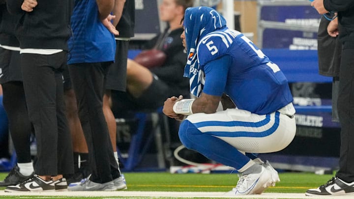 Indianapolis Colts quarterback Anthony Richardson (5) watches the action on the field from the sideline Sunday, Sept. 29, 2024, during a game against the Pittsburgh Steelers at Lucas Oil Stadium in Indianapolis.