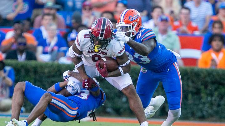 Florida Gators defensive lineman Princely Umanmielen (33)  stops South Carolina Gamecocks tight end Jaheim Bell (0) during first half action as Florida takes on South Carolina at Steve Spurrier Field at Ben Hill Griffin Stadium in Gainesville, FL on Saturday, November 12, 2022. [Alan Youngblood/Gainesville Sun]

Ncaa Football Florida Gators Vs South Carolina