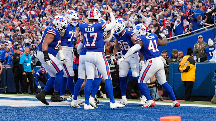 Nov 2, 2025; Orchard Park, New York, USA; Buffalo Bills quarterback Josh Allen (17) celebrates a touchdown scored by tight end Dalton Kincaid (86) in the first quarter against the Kansas City Chiefs