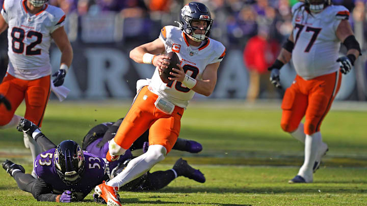 Nov 3, 2024; Baltimore, Maryland, USA; Denver Broncos quarterback Bo Nix (10) runs for a gain in the second quarter against the Baltimore Ravens at M&T Bank Stadium. Nov 3, 2024; Baltimore, Maryland, USA; Denver Broncos quarterback Bo Nix (10) runs for a gain in the second quarter against the Baltimore Ravens at M&T Bank Stadium.