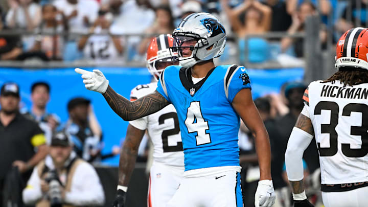 Aug 8, 2025; Charlotte, North Carolina, USA;  Carolina Panthers wide receiver Tetairoa McMillan (4) reacts in the first quarter at Bank of America Stadium. Mandatory Credit: Bob Donnan-Imagn Images