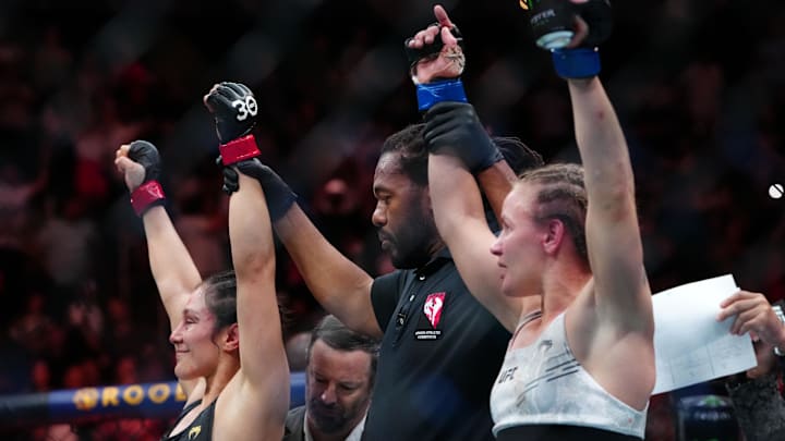 Sep 16, 2023; Las Vegas, Nevada, USA; Alexa Grasso (red gloves) and Valentina Shevchenko (blue