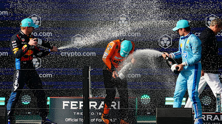 May 5, 2024; Miami Gardens, Florida, USA; Red Bull Racing driver Max Verstappen (left) and Ferrari