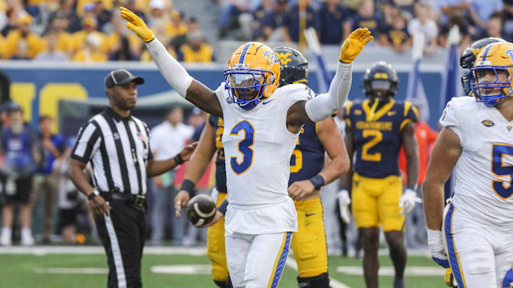 Sep 13, 2025; Morgantown, West Virginia, USA; Pittsburgh Panthers linebacker Rasheem Biles (3) celebrates a defensive stop during the third quarter against the West Virginia Mountaineers at Milan Puskar Stadium. Mandatory Credit: Ben Queen-Imagn Images