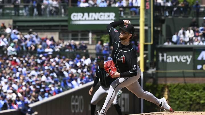 May 2, 2026; Chicago, Illinois, USA;  Arizona Diamondbacks pitcher Ryne Nelson (19) delivers a pitch during the first inning against the Chicago Cubs at Wrigley Field. Mandatory Credit: Matt Marton-Imagn Images