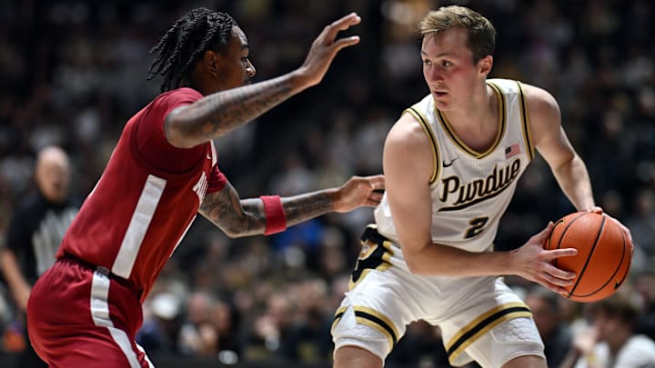 Purdue Boilermakers guard Fletcher Loyer (2) looks to get past Alabama Crimson Tide guard Labaron Philon (0) Purdue Boilermakers guard Fletcher Loyer (2) looks to get past Alabama Crimson Tide guard Labaron Philon (0)