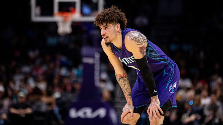Mar 1, 2025; Charlotte, North Carolina, USA; Charlotte Hornets guard LaMelo Ball (1) looks on during a free throw in the fourth quarter against the Washington Wizards at Spectrum Center. Mandatory Credit: Scott Kinser-Imagn Images