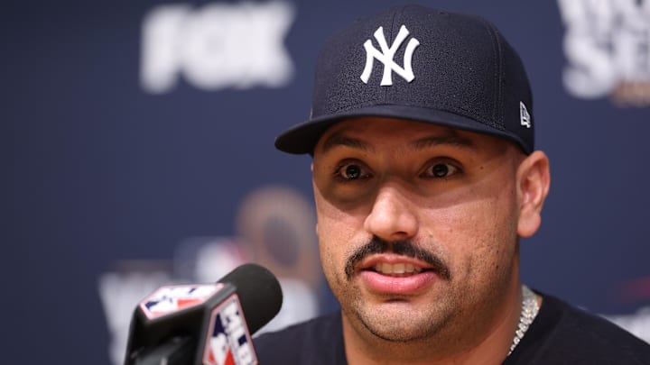 Oct 25, 2024; Los Angeles, California, USA; New York Yankees pitcher Nestor Cortes Jr (65) talks to the media prior to the game against the Los Angeles Dodgers during game one of the 2024 MLB World Series at Dodger Stadium. Mandatory Credit:  Kiyoshi Mio-Imagn Images