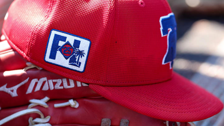 Feb 26, 2025; Dunedin, Florida, USA; Philadelphia Phillies outfielder Gabriel Rincones Jr. (85) hat sits in the dugout against the Toronto Blue Jays in the fifth inning during spring training at TD Ballpark. 