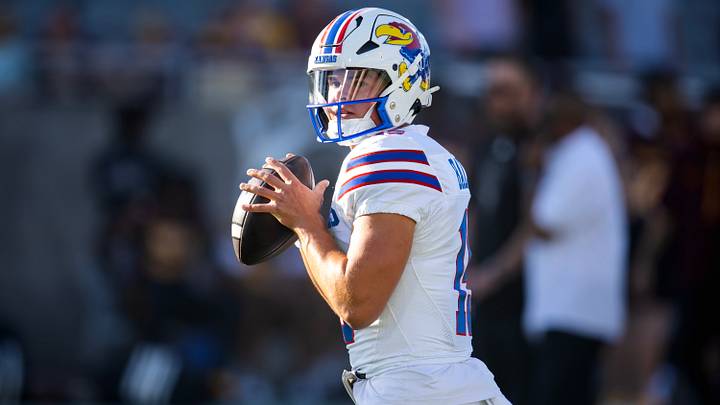 Oct 5, 2024; Tempe, Arizona, USA; Kansas Jayhawks quarterback Cole Ballard (15) against the Arizona State Sun Devils at Mountain America Stadium. Mandatory Credit: Mark J. Rebilas-Imagn Images