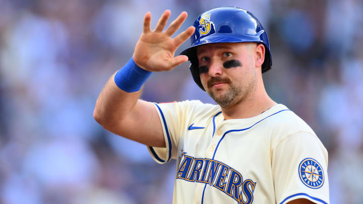 Seattle Mariners designated hitter Cal Raleigh (29) waves to the crowd during the eighth inning against the Los Angeles Dodgers at T-Mobile Park.