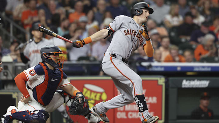Apr 1, 2025; Houston, Texas, USA; San Francisco Giants right fielder Mike Yastrzemski (5) hits a single during the sixth inning against the Houston Astros at Daikin Park. Apr 1, 2025; Houston, Texas, USA; San Francisco Giants right fielder Mike Yastrzemski (5) hits a single during the sixth inning against the Houston Astros at Daikin Park.