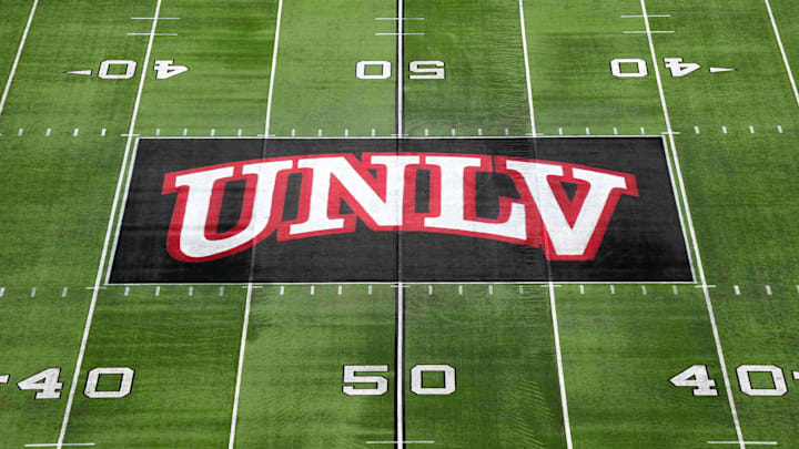 The UNLV Rebels logo at midfield during the Mountain West Championship at Allegiant Stadium. Mandatory Credit: Kirby Lee-Imagn Images