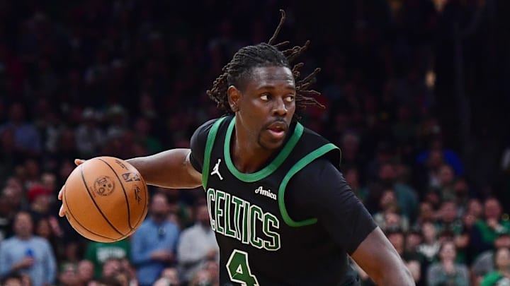 May 14, 2025; Boston, Massachusetts, USA: Boston Celtics guard Jrue Holiday (4) controls the ball in the second half during game five of the second round for the 2025 NBA Playoffs against the New York Knicks at TD Garden. Mandatory Credit: Bob DeChiara-Imagn Images