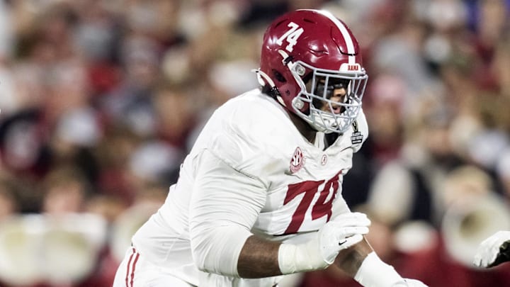 Dec 19, 2025; Norman, OK, USA; Alabama Crimson Tide offensive lineman Kadyn Proctor (74) against the Oklahoma Sooners during the CFP National Playoff First Round at Gaylord Family Oklahoma Memorial Stadium. Mandatory Credit: Mark J. Rebilas-Imagn Images