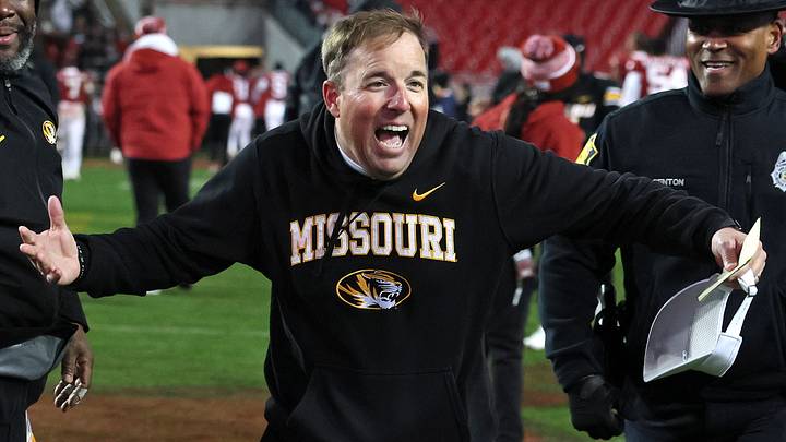 Missouri Tigers coach Eli Drinkwitz celebrates after a game against the Arkansas Razorbacks at Donald W. Reynolds Razorback Stadium. Missouri won 31-17. Missouri Tigers coach Eli Drinkwitz celebrates after a game against the Arkansas Razorbacks at Donald W. Reynolds Razorback Stadium. Missouri won 31-17.