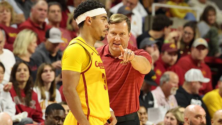 Nov 3, 2025; Ames, Iowa, USA; Iowa State Cyclones head coach T.J. Otzelberger talks with guard Tamin Lipsey (3) during a game with the Fairleigh Dickinson Knights at James H. Hilton Coliseum. Mandatory Credit: Reese Strickland-Imagn Images