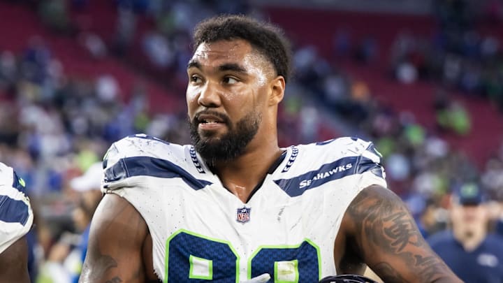 Dec 8, 2024; Glendale, Arizona, USA; Seattle Seahawks defensive end Leonard Williams (99) against the Arizona Cardinals at State Farm Stadium. Mandatory Credit: Mark J. Rebilas-Imagn Images